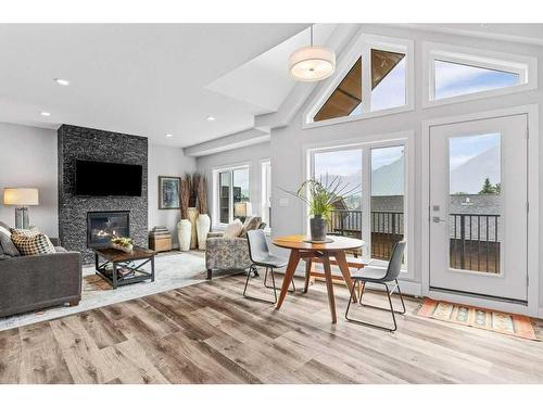 405-810 7Th Street, Canmore, AB - Indoor Photo Showing Living Room With Fireplace