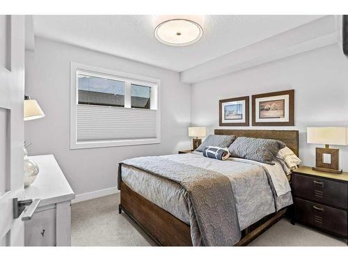 405-810 7Th Street, Canmore, AB - Indoor Photo Showing Bedroom