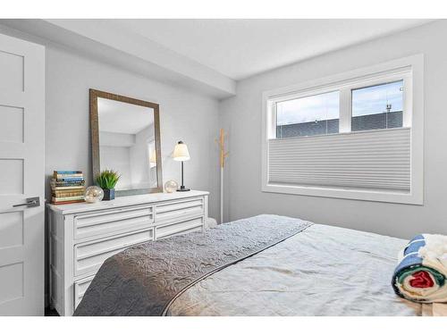 405-810 7Th Street, Canmore, AB - Indoor Photo Showing Bedroom