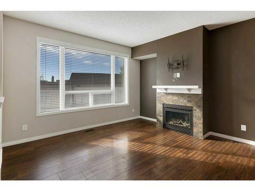 171 Kincora Heath Nw, Calgary, AB - Indoor Photo Showing Living Room With Fireplace