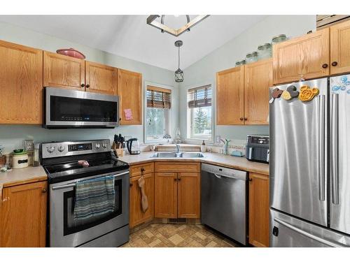 108 Willow Green, Olds, AB - Indoor Photo Showing Kitchen With Double Sink