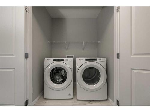 155 Corner Meadows Grove Ne, Calgary, AB - Indoor Photo Showing Laundry Room