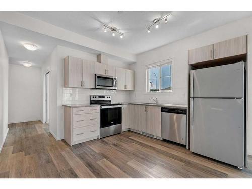 2206-298 Sage Meadows Park Nw, Calgary, AB - Indoor Photo Showing Kitchen With Stainless Steel Kitchen With Upgraded Kitchen