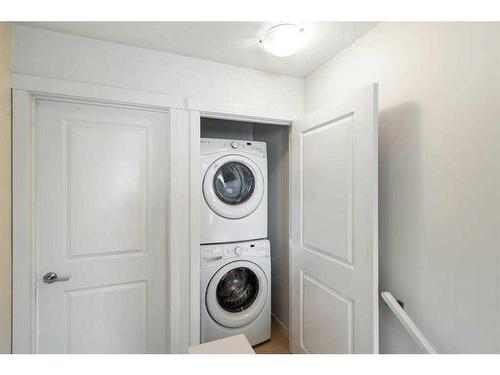 57 Sherwood Lane Nw, Calgary, AB - Indoor Photo Showing Laundry Room