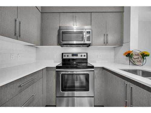 2310-302 Skyview Ranch Drive Ne, Calgary, AB - Indoor Photo Showing Kitchen With Stainless Steel Kitchen With Upgraded Kitchen