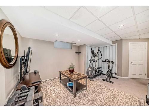 49 Saddlecrest Close Ne, Calgary, AB - Indoor Photo Showing Gym Room