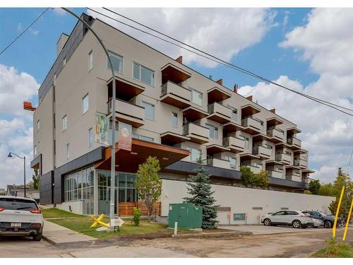 406-3450 19 Street Sw, Calgary, AB - Outdoor With Balcony With Facade