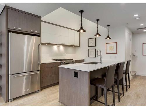 406-3450 19 Street Sw, Calgary, AB - Indoor Photo Showing Kitchen With Stainless Steel Kitchen With Upgraded Kitchen