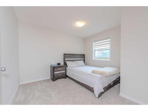 316 Morningside Crescent Sw, Airdrie, AB - Indoor Photo Showing Bedroom