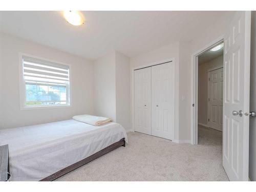 316 Morningside Crescent Sw, Airdrie, AB - Indoor Photo Showing Bedroom