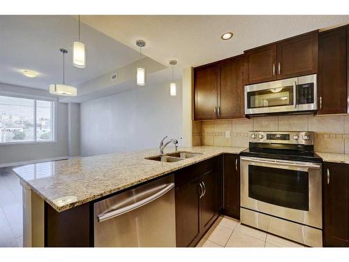 207-32 Varsity Estates Circle Nw, Calgary, AB - Indoor Photo Showing Kitchen With Stainless Steel Kitchen With Double Sink