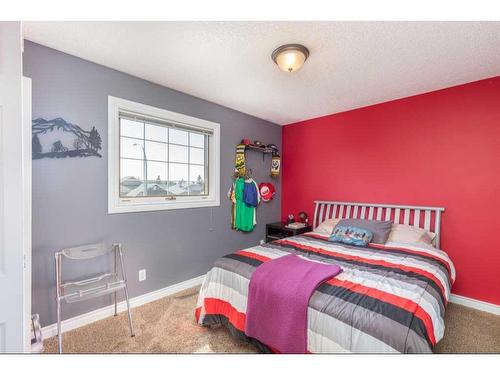 1112 High Country Drive Nw, High River, AB - Indoor Photo Showing Bedroom