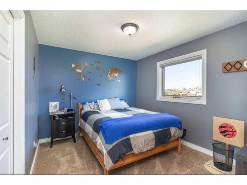 1112 High Country Drive Nw, High River, AB - Indoor Photo Showing Bedroom