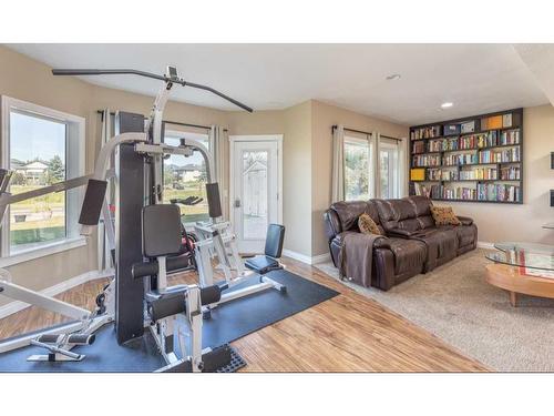 1112 High Country Drive Nw, High River, AB - Indoor Photo Showing Gym Room