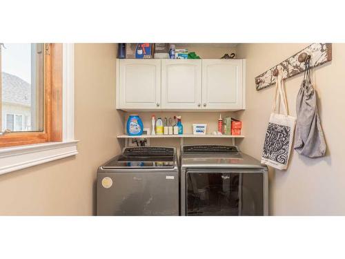 1112 High Country Drive Nw, High River, AB - Indoor Photo Showing Laundry Room