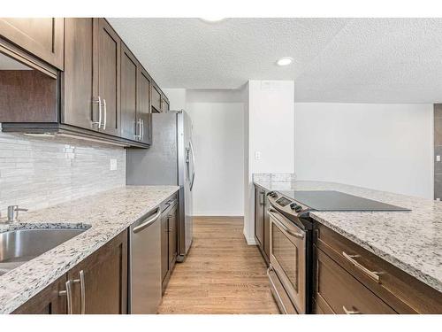 804-215 14 Avenue Sw, Calgary, AB - Indoor Photo Showing Kitchen With Stainless Steel Kitchen With Upgraded Kitchen