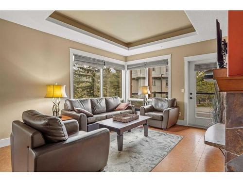 107Bf-187 Kananaskis Way, Canmore, AB - Indoor Photo Showing Living Room