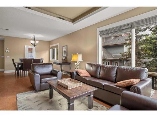 107Bf-187 Kananaskis Way, Canmore, AB - Indoor Photo Showing Living Room