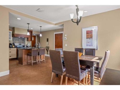 107Bf-187 Kananaskis Way, Canmore, AB - Indoor Photo Showing Dining Room