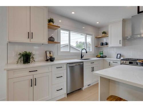 23 Hoover Place Sw, Calgary, AB - Indoor Photo Showing Kitchen With Stainless Steel Kitchen With Upgraded Kitchen