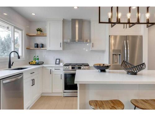 23 Hoover Place Sw, Calgary, AB - Indoor Photo Showing Kitchen With Stainless Steel Kitchen With Upgraded Kitchen