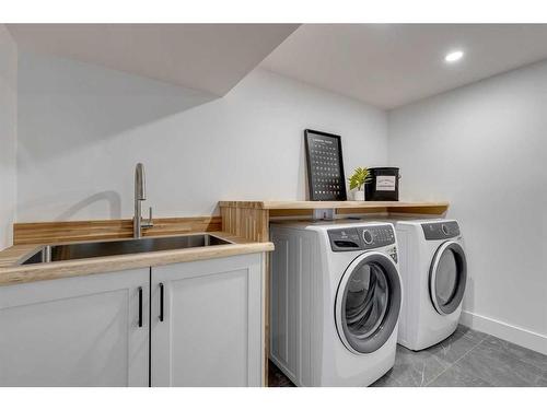 23 Hoover Place Sw, Calgary, AB - Indoor Photo Showing Laundry Room