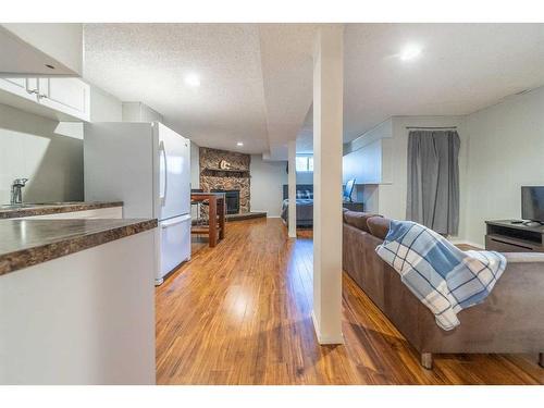 7846 20A Street Se, Calgary, AB - Indoor With Fireplace