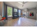 7846 20A Street Se, Calgary, AB  - Indoor Photo Showing Living Room 