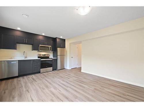 22 Valarosa Park, Didsbury, AB - Indoor Photo Showing Kitchen With Stainless Steel Kitchen