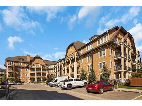 312-30 Mahogany Mews Se, Calgary, AB - Outdoor With Balcony With Facade