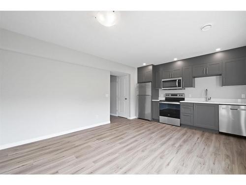 24 Valarosa Park, Didsbury, AB - Indoor Photo Showing Kitchen With Stainless Steel Kitchen