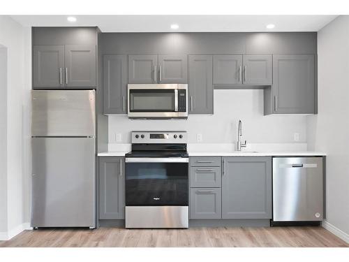 24 Valarosa Park, Didsbury, AB - Indoor Photo Showing Kitchen With Stainless Steel Kitchen