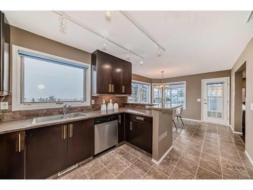 105 Hawkbury Close Nw, Calgary, AB - Indoor Photo Showing Kitchen With Double Sink