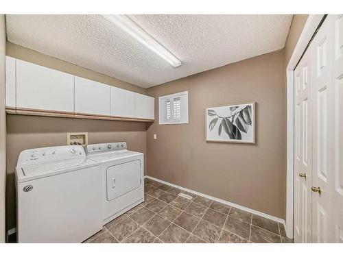 105 Hawkbury Close Nw, Calgary, AB - Indoor Photo Showing Laundry Room