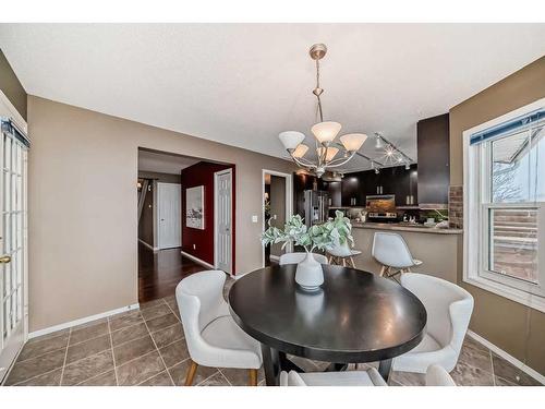 105 Hawkbury Close Nw, Calgary, AB - Indoor Photo Showing Dining Room