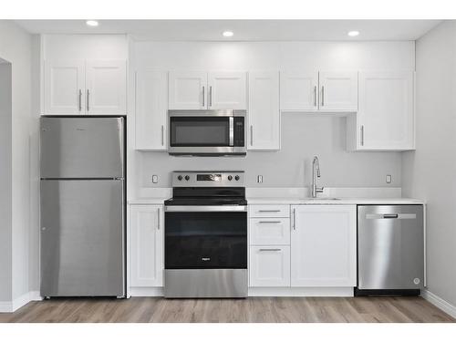 26 Valarosa Park, Didsbury, AB - Indoor Photo Showing Kitchen With Stainless Steel Kitchen