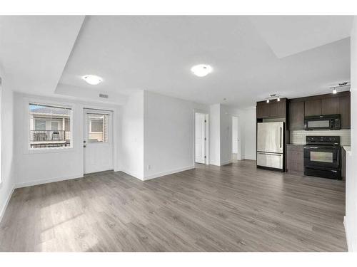 218-300 Marina Drive, Chestermere, AB - Indoor Photo Showing Kitchen