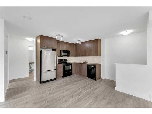 218-300 Marina Drive, Chestermere, AB - Indoor Photo Showing Kitchen