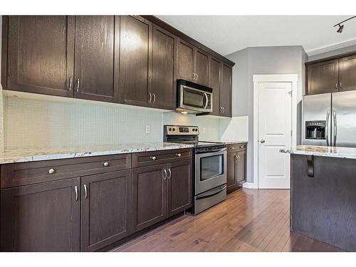 396 Rainbow Falls Drive, Chestermere, AB - Indoor Photo Showing Kitchen With Upgraded Kitchen