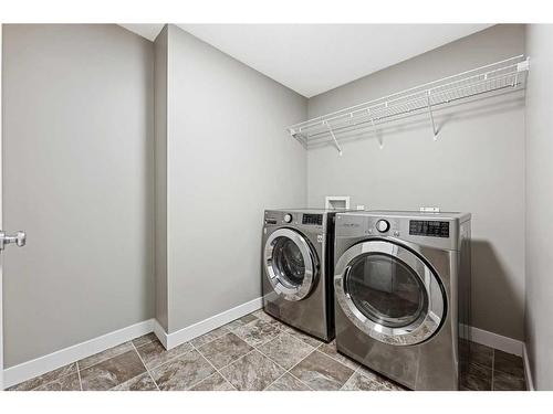 396 Rainbow Falls Drive, Chestermere, AB - Indoor Photo Showing Laundry Room