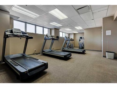 1408-1053 10 Street Sw, Calgary, AB - Indoor Photo Showing Gym Room