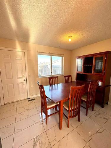 100 Martindale Boulevard Ne, Calgary, AB - Indoor Photo Showing Dining Room