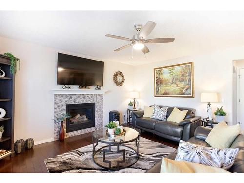 157 Sherwood Circle Nw, Calgary, AB - Indoor Photo Showing Living Room With Fireplace