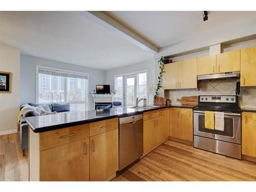 205-138 18 Avenue Se, Calgary, AB - Indoor Photo Showing Kitchen With Stainless Steel Kitchen