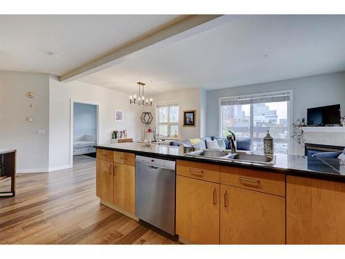 205-138 18 Avenue Se, Calgary, AB - Indoor Photo Showing Kitchen With Double Sink