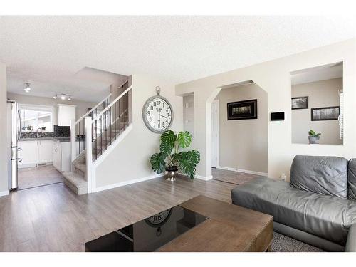 142 Bridleridge Circle Sw, Calgary, AB - Indoor Photo Showing Living Room