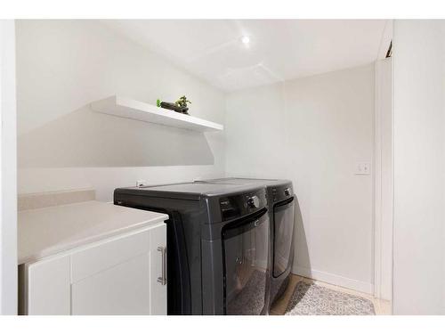 142 Bridleridge Circle Sw, Calgary, AB - Indoor Photo Showing Laundry Room