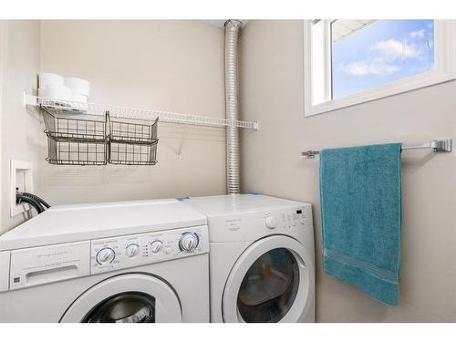 182 Copperfield Lane Se, Calgary, AB - Indoor Photo Showing Laundry Room