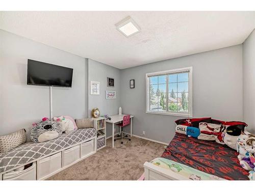 128 Somercrest Manor Sw, Calgary, AB - Indoor Photo Showing Bedroom