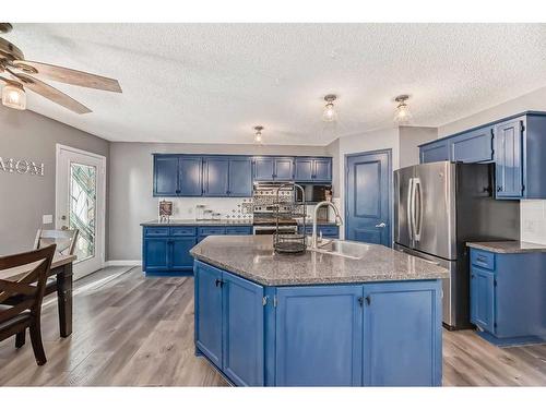 128 Somercrest Manor Sw, Calgary, AB - Indoor Photo Showing Kitchen With Double Sink